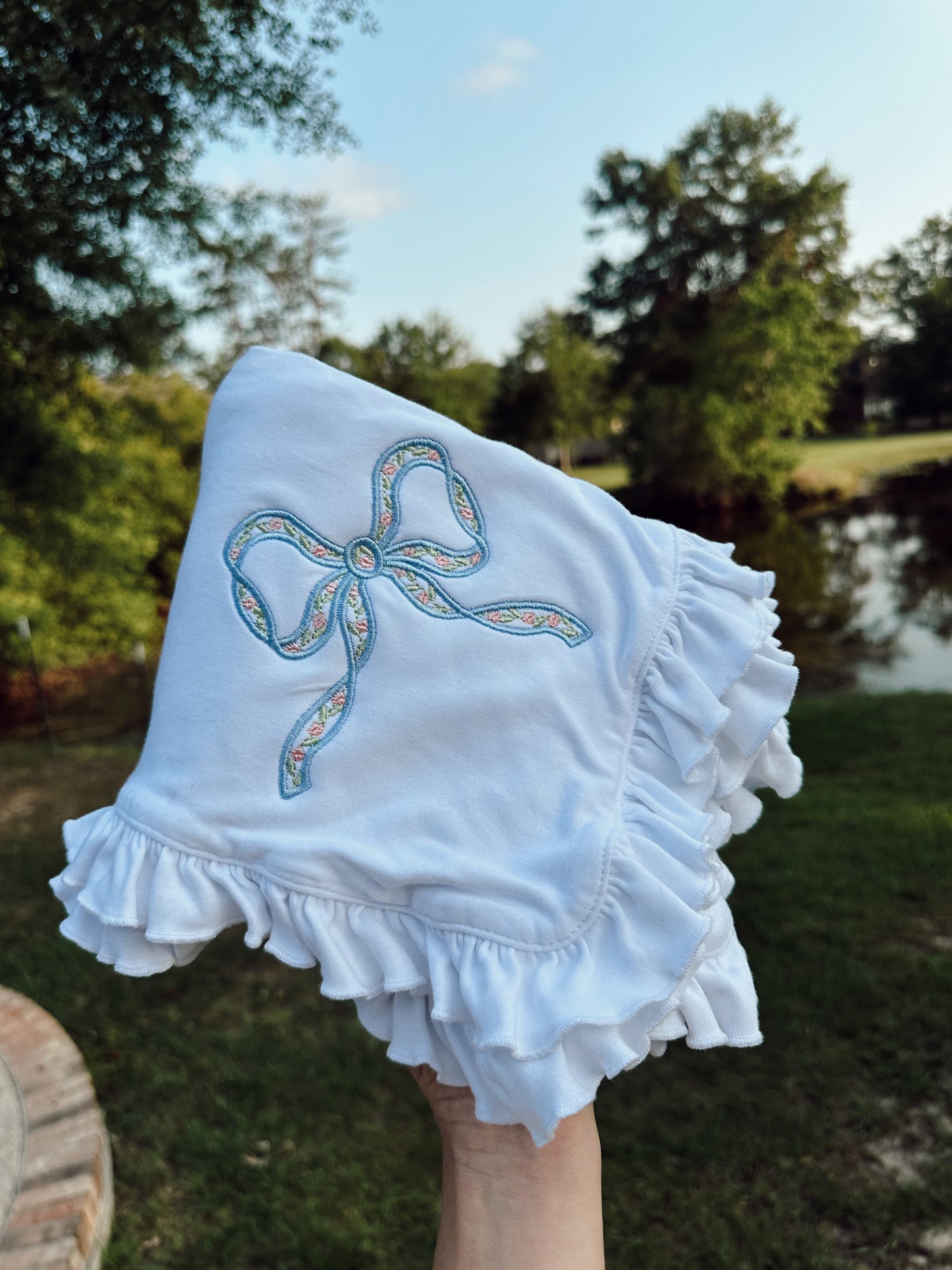 Ruffle bow blanket